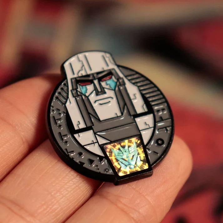 Transformers – Official 40th Anniversary Twin Set of Pin Badges Pin Set - Tophatter Daily Deals