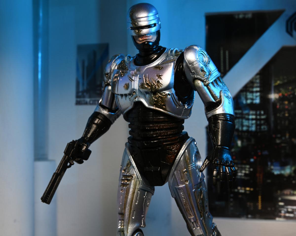 RoboCop – Official Ultimate Battle-Damaged RoboCop with Chair Figure Action Figure - Tophatter Daily Deals