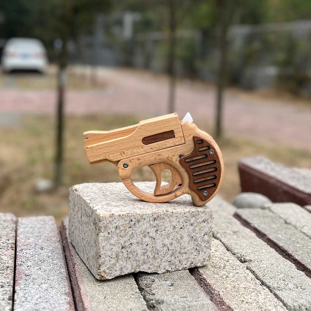Mini Revolver Assembled Solid Wood Rubber Band Gun - Tophatter Daily Deals