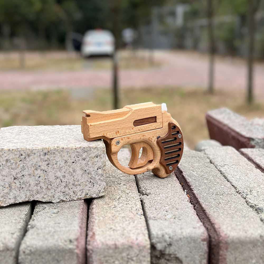 Mini Revolver Assembled Solid Wood Rubber Band Gun - Tophatter Daily Deals