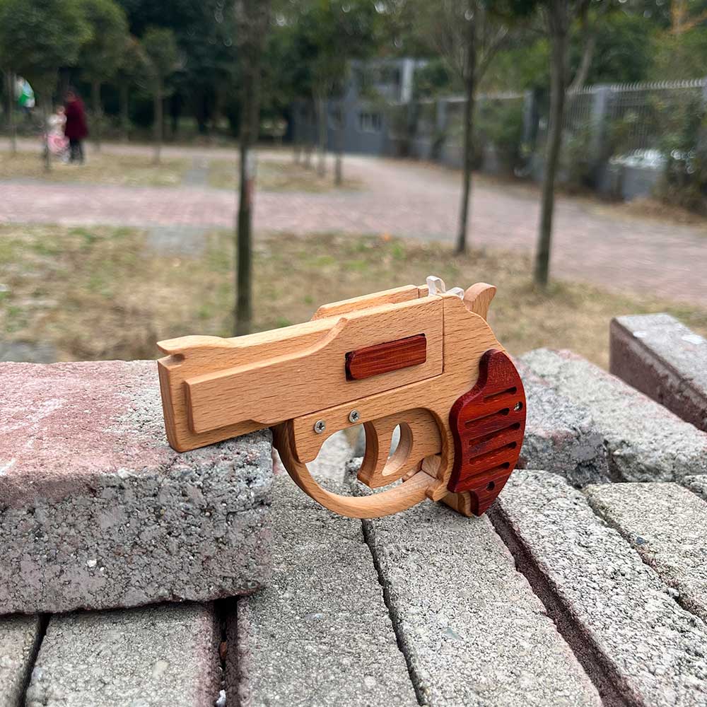 Solid Wood Mini Revolver Rubber Band Gun - Tophatter Daily Deals