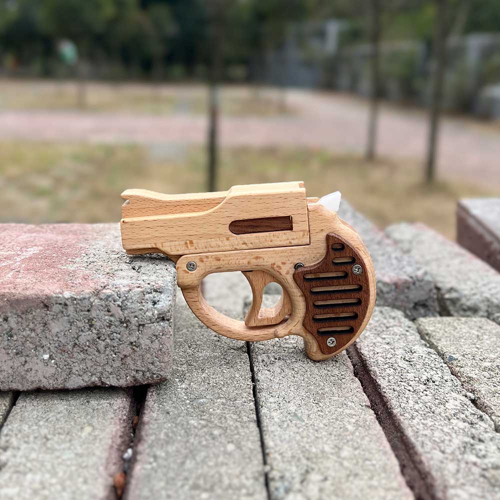 Mini Revolver Assembled Solid Wood Rubber Band Gun - Tophatter Daily Deals