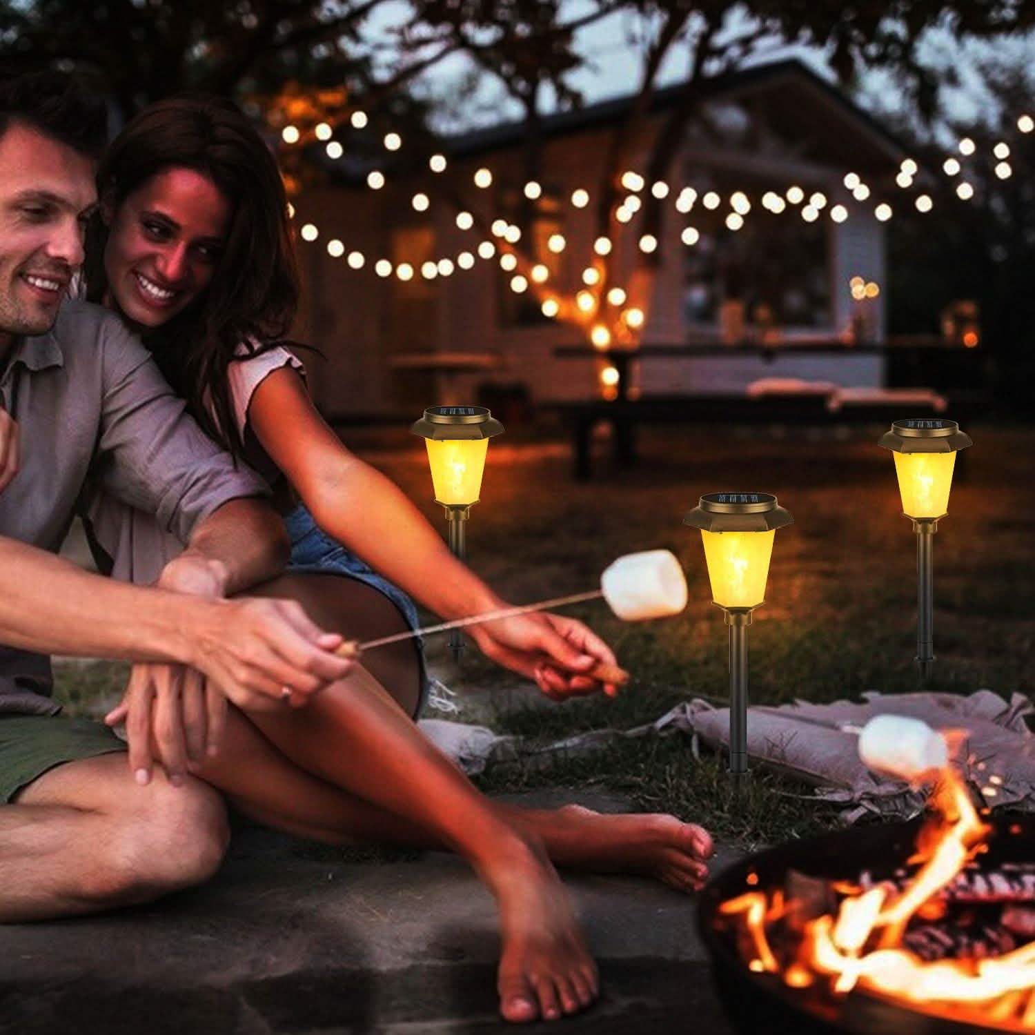 2-Piece: Solar Flame Torch Light Outdoor Lighting - Tophatter Daily Deals