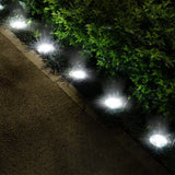 4-Pieces: Solar Powered Ground Light Outdoor Lighting - Tophatter Daily Deals