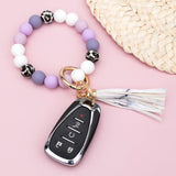 Silicone Monochromatic Key Ring Bracelet Lilacs Bracelets - Tophatter Daily Deals