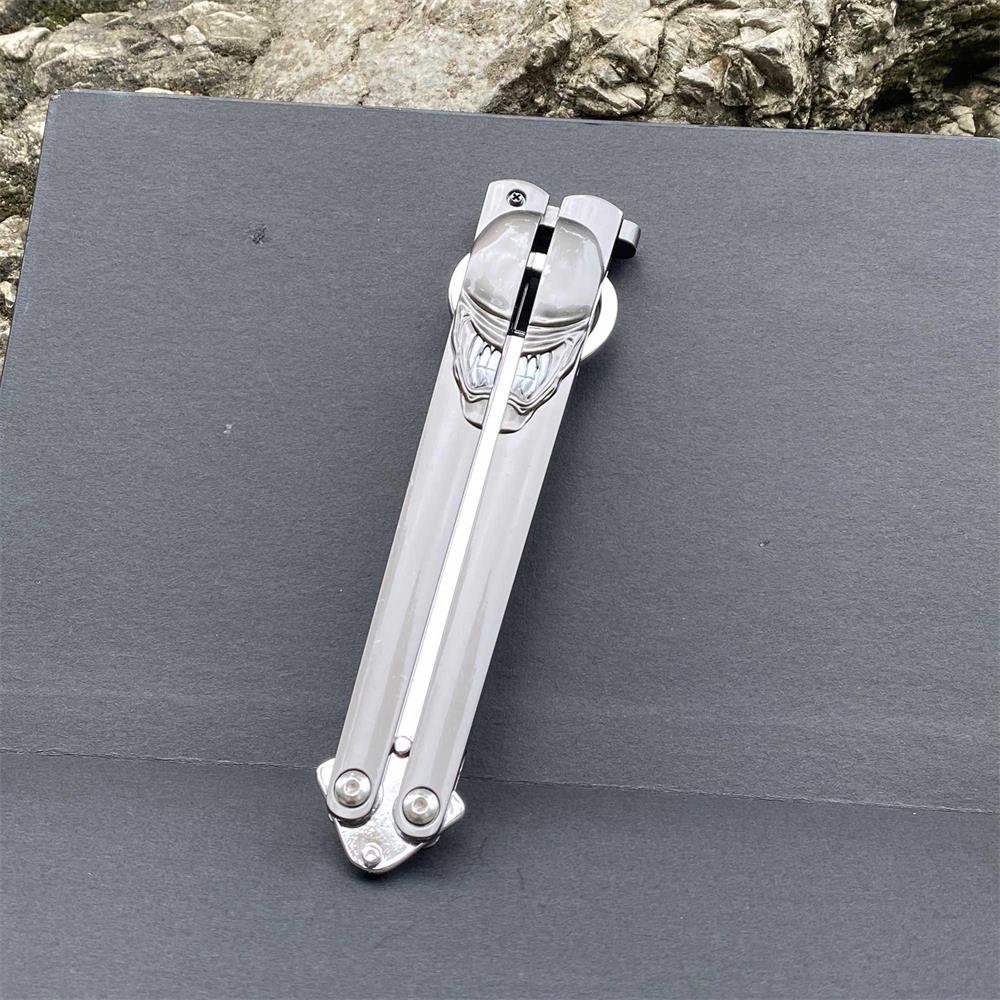 Metal Predator & Alien Balisong Bottle Opener - Tophatter Daily Deals