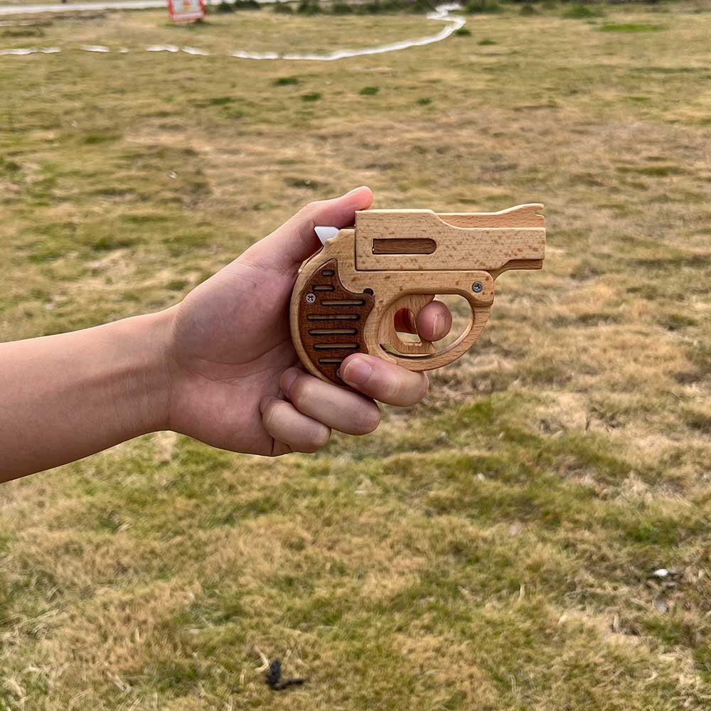 Mini Revolver Assembled Solid Wood Rubber Band Gun - Tophatter Daily Deals