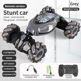 4WD RC Off Road Stunt Wheels Drift Car With Music Led Lights 2.4G Gesture Remote Control Spray 360 Rotating Climbing Car Toys 4 - Tophatter Daily Deals