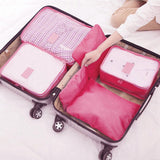 9-Piece: Clothes Storage Bags Water-Resistant Travel Luggage Organizer Storage & Organization - Tophatter Daily Deals