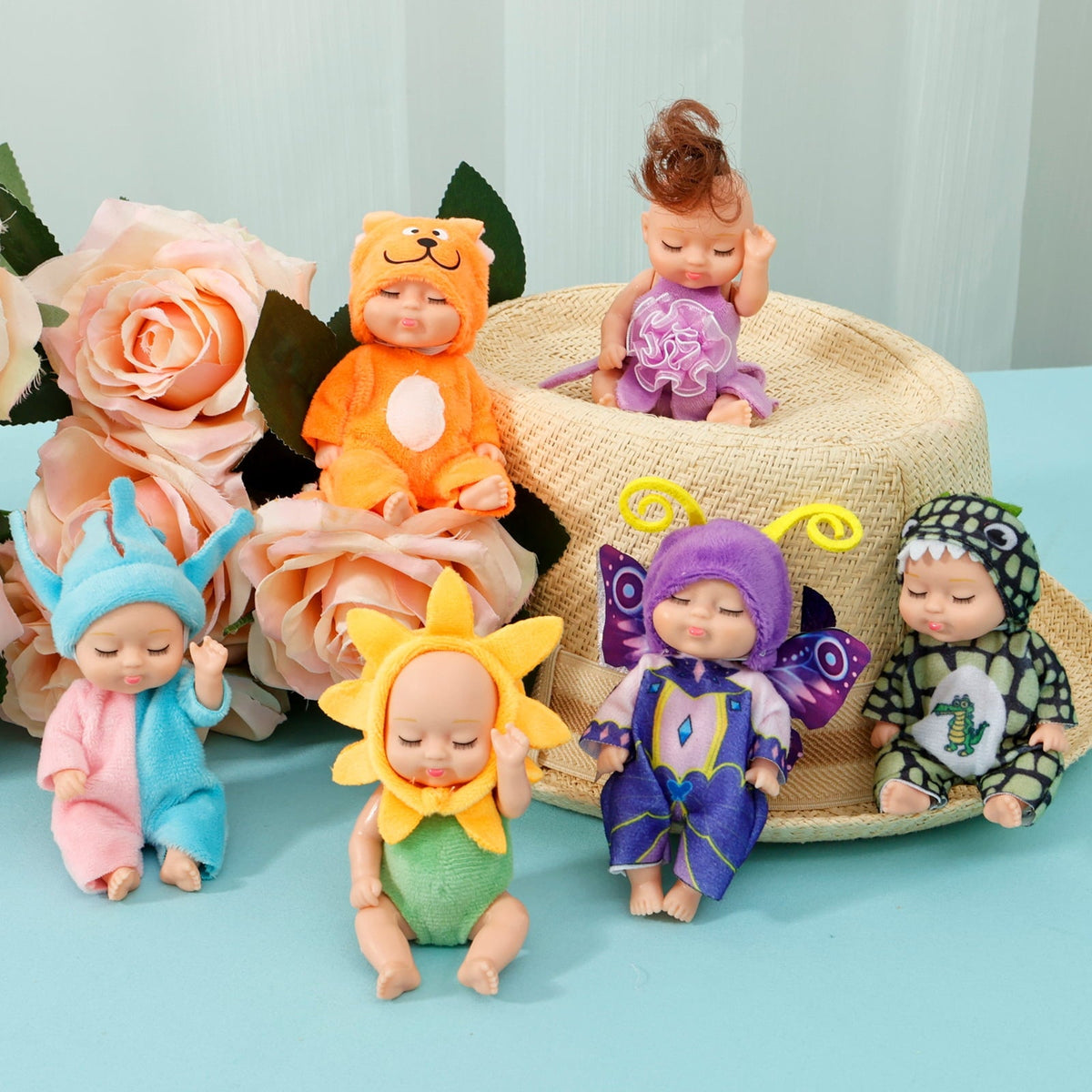 6-Piece Mini Baby Doll Set with Butterfly and Flower Outfits, 4 Inch Doll - Tophatter Daily Deals
