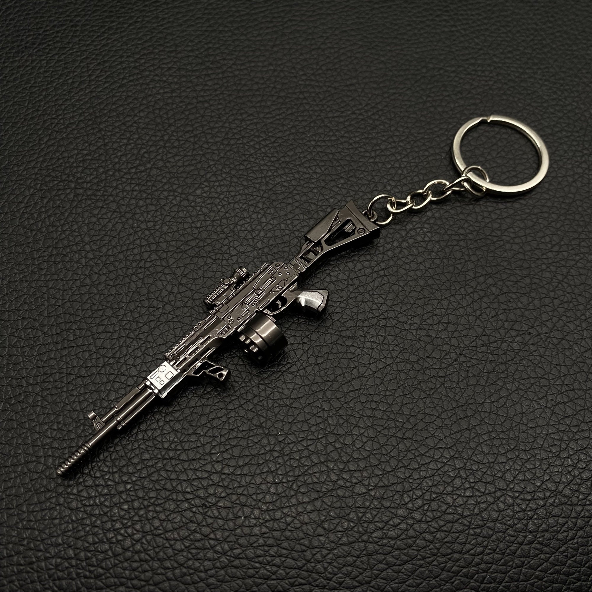 14 in 1 Keychain of Advanced Morden Gun With Accessories - Tophatter Daily Deals