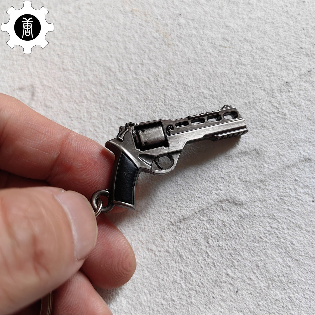Mini Bull R45 Revolver Pistol Metal Keychain - Tophatter Daily Deals