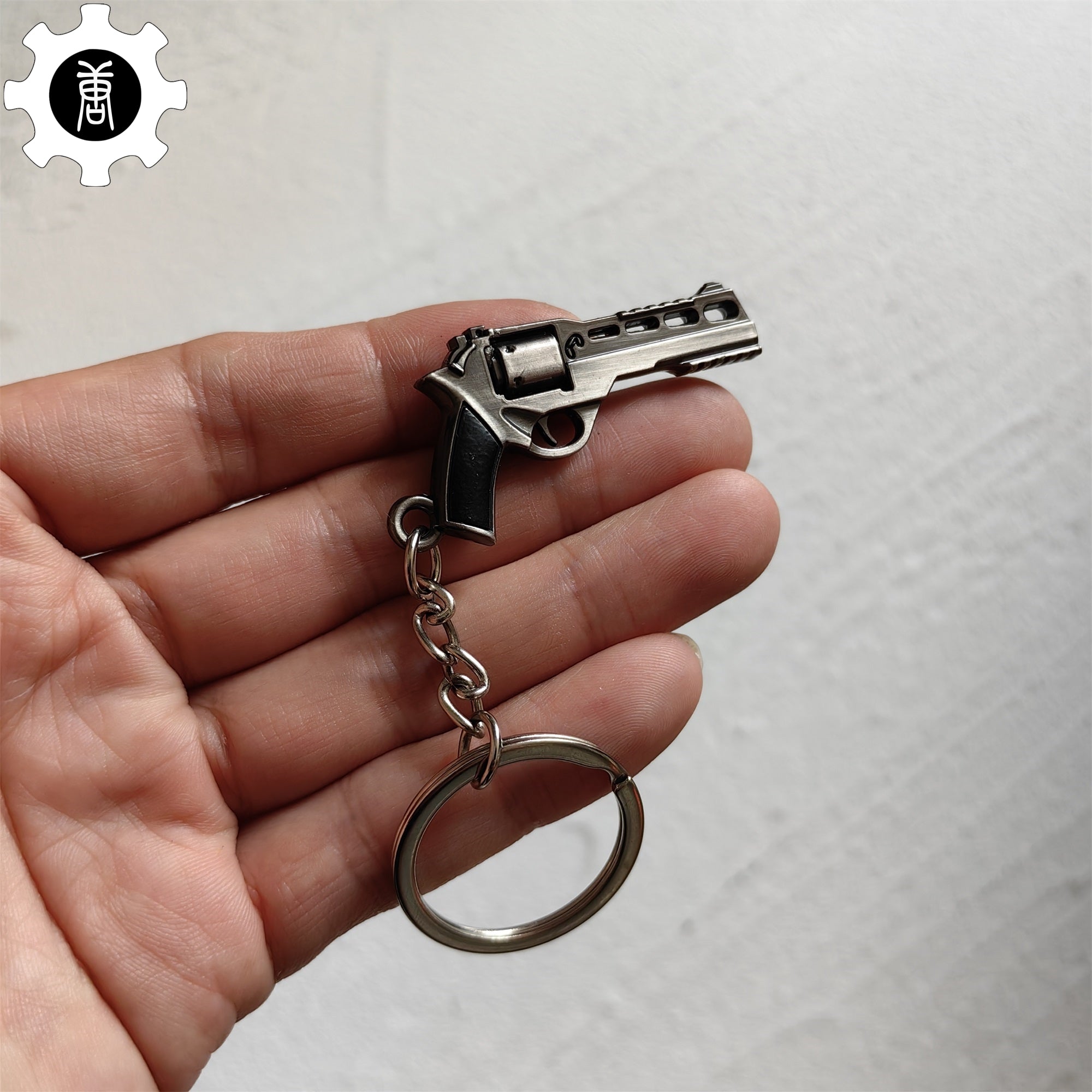 Mini Bull R45 Revolver Pistol Metal Keychain - Tophatter Daily Deals