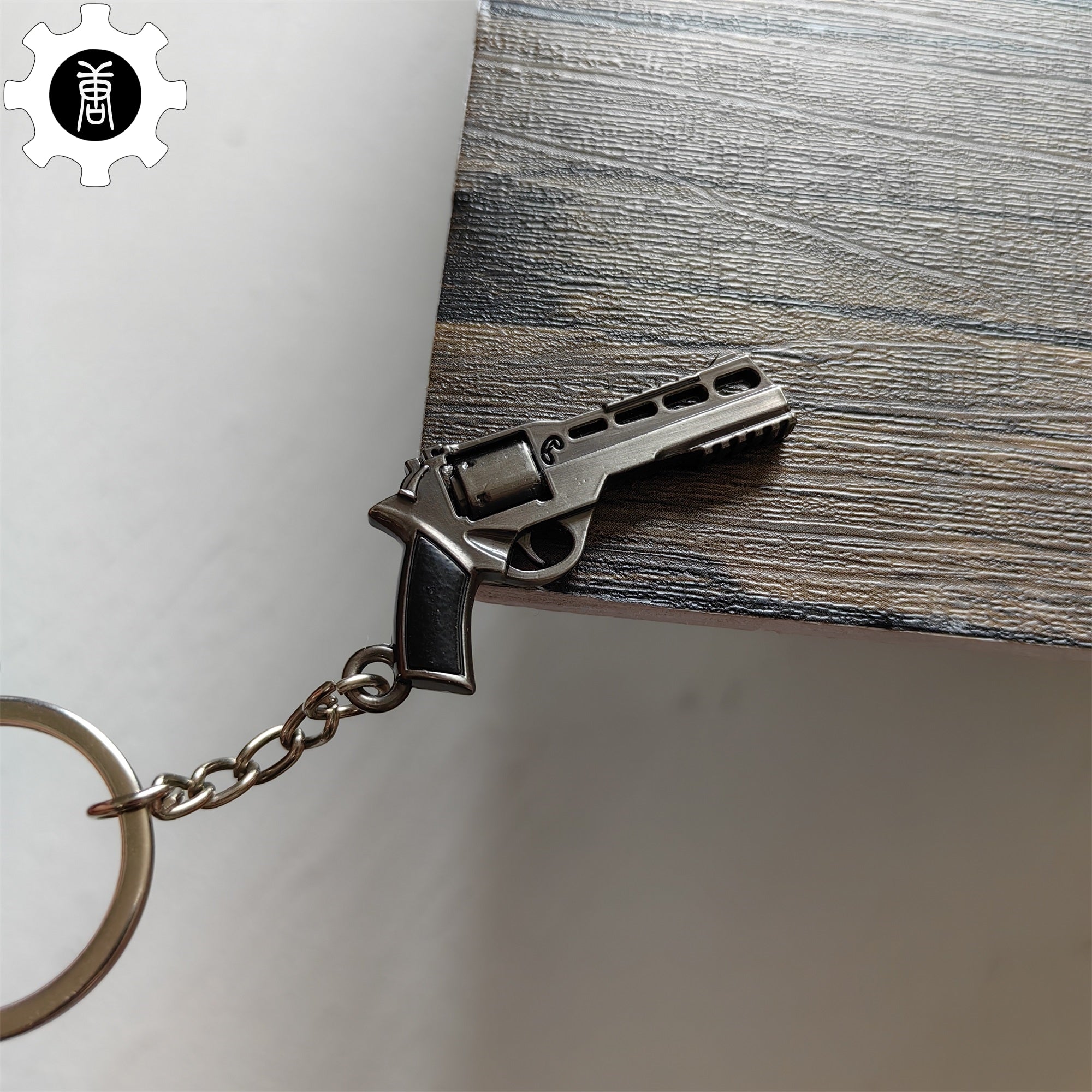 Mini Bull R45 Revolver Pistol Metal Keychain - Tophatter Daily Deals