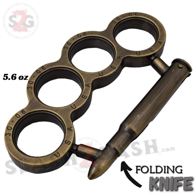 Bullet Knuckles w/ Hidden Knife Rifle Cartridge Paperweight - Asst. colors Belt Buckle - Tophatter Daily Deals