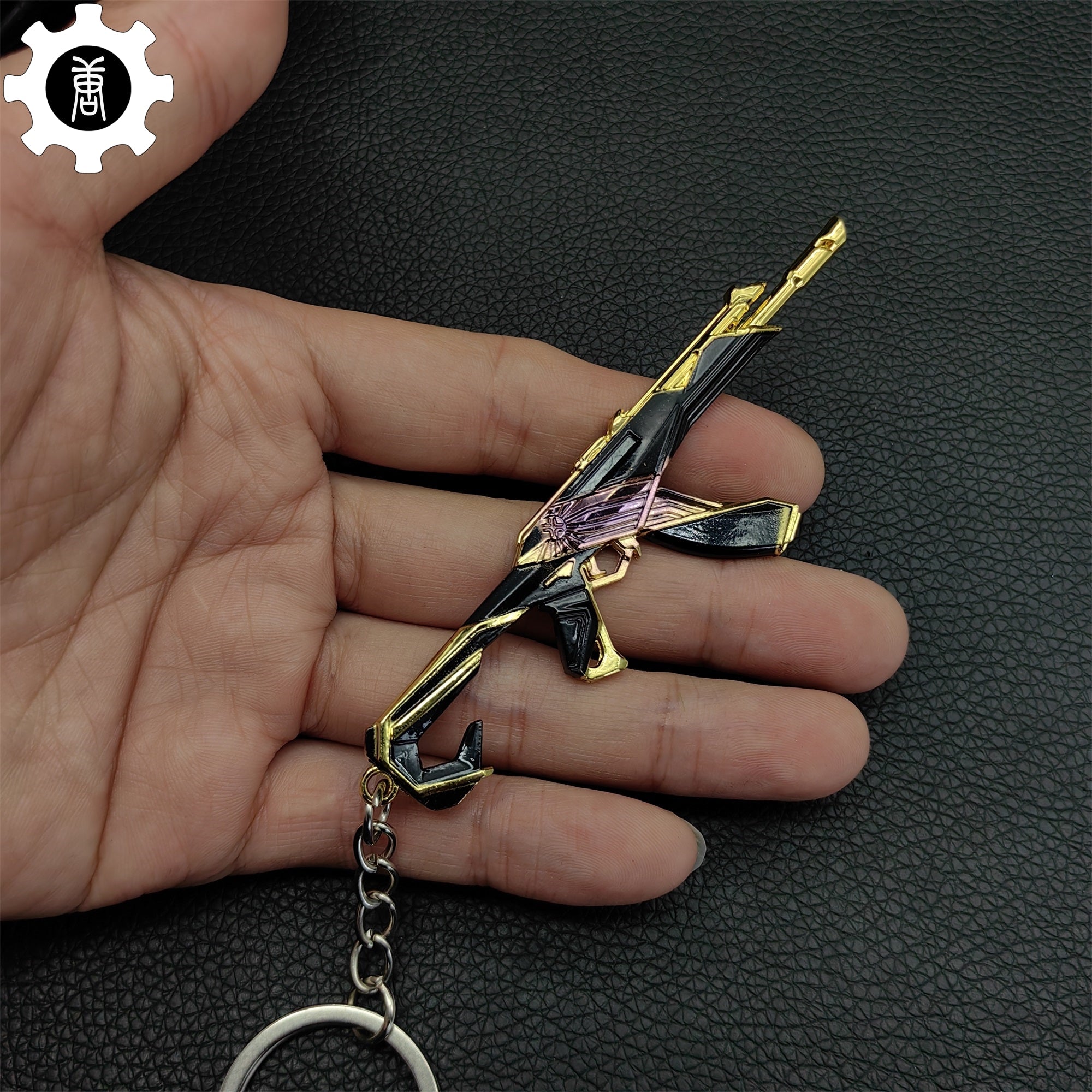 Mini Champions Vandal Gun Metal Keychain - Tophatter Daily Deals