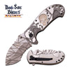 Spring Assisted Folding Knife Gray White Glow-in-Dark Skull Serrated Blade Collectible Weapons - Tophatter Daily Deals