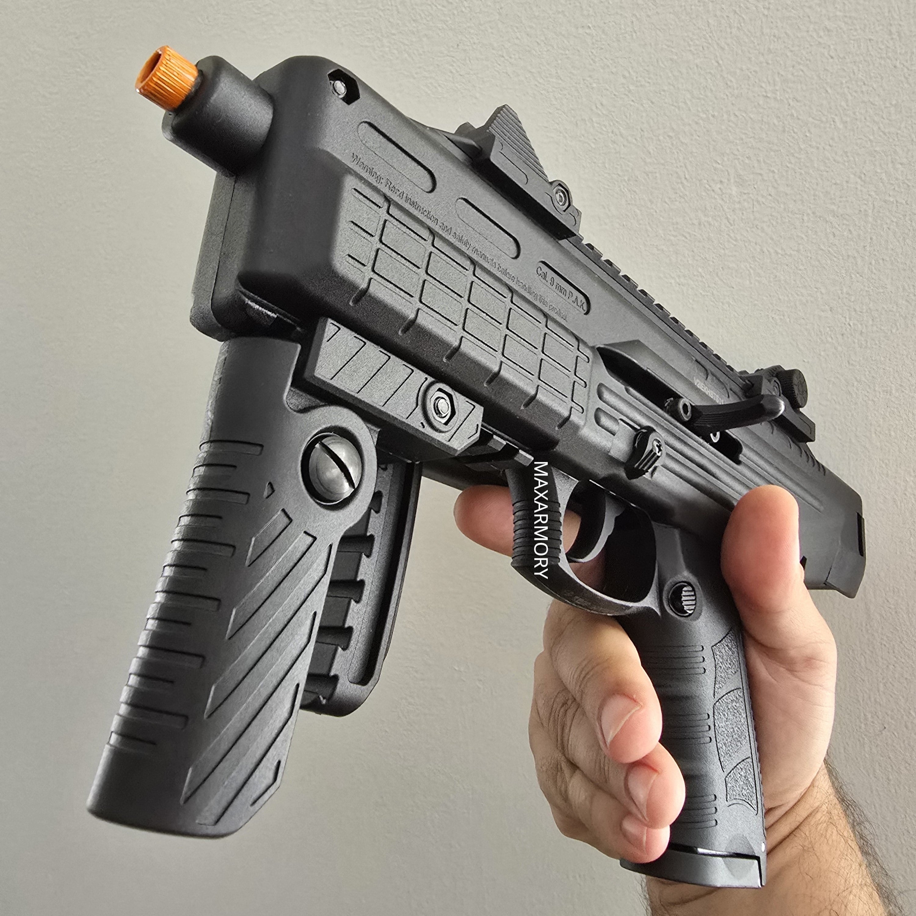 NEW RELEASE! EKOL GANNET Black - Full Auto Front Firing 9mm Blank Machine Gun with Folding Stock - Tophatter's Weapons'N'Deals Blank Firing Replica Guns - Tophatter Daily Deals