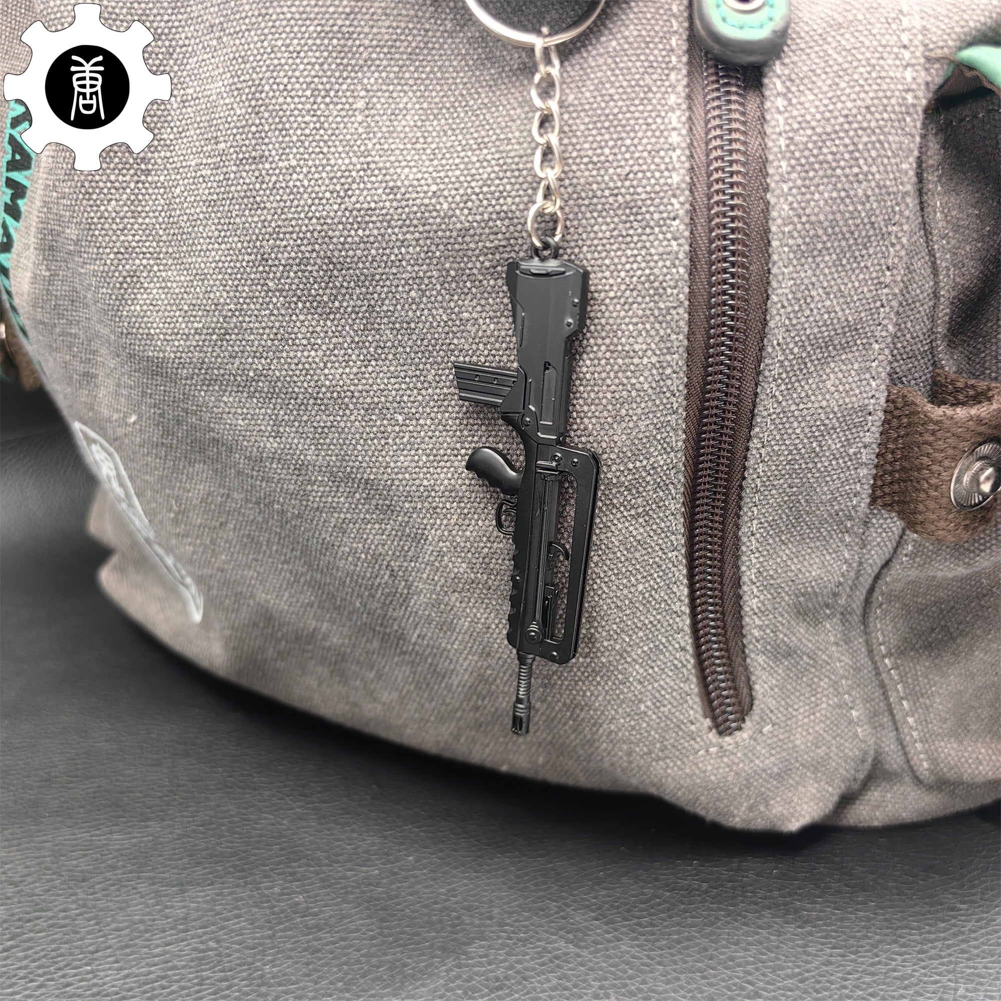 Mini FAMAS Assault Rifle Metal Keychain - Tophatter Daily Deals