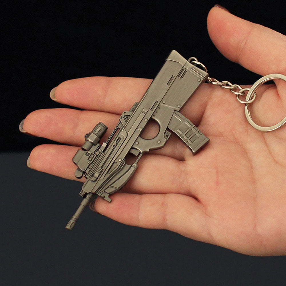 14 in 1 Keychain of Advanced Morden Gun With Accessories - Tophatter Daily Deals
