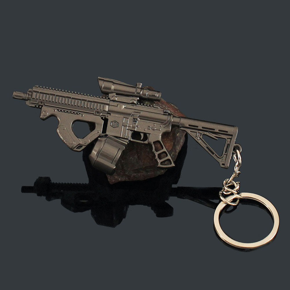 14 in 1 Keychain of Advanced Morden Gun With Accessories - Tophatter Daily Deals