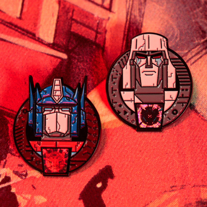 Transformers – Official 40th Anniversary Twin Set of Pin Badges Pin Set - Tophatter Daily Deals