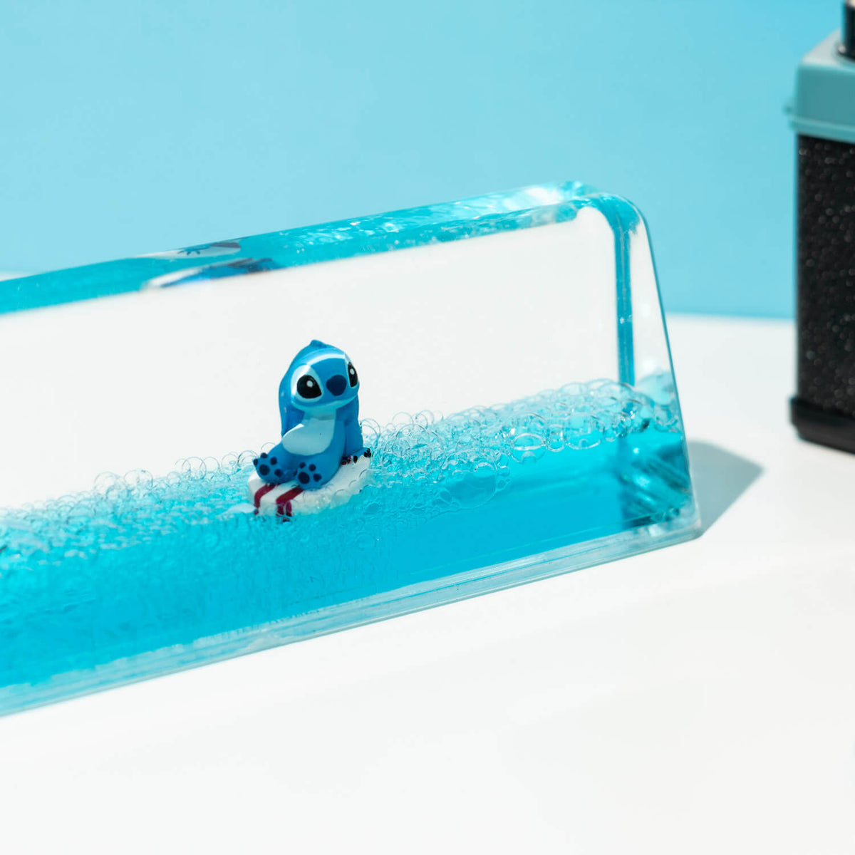 Disney Stitch – Surfing Stitch Set of 2 Pens with 3D Acrylic Stand Collectible - Tophatter Daily Deals