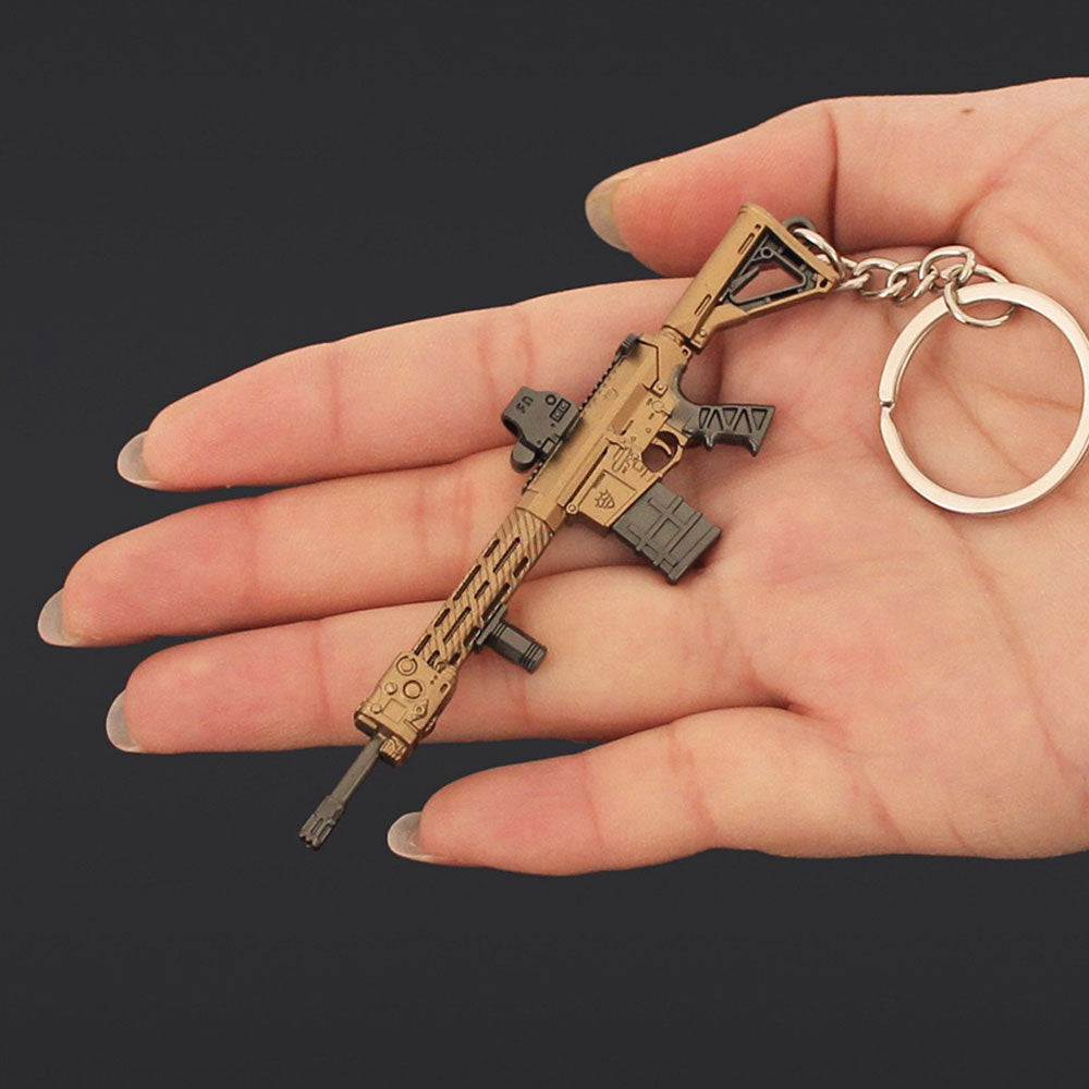 14 in 1 Keychain of Advanced Morden Gun With Accessories - Tophatter Daily Deals