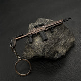 14 in 1 Keychain of Advanced Morden Gun With Accessories - Tophatter Daily Deals