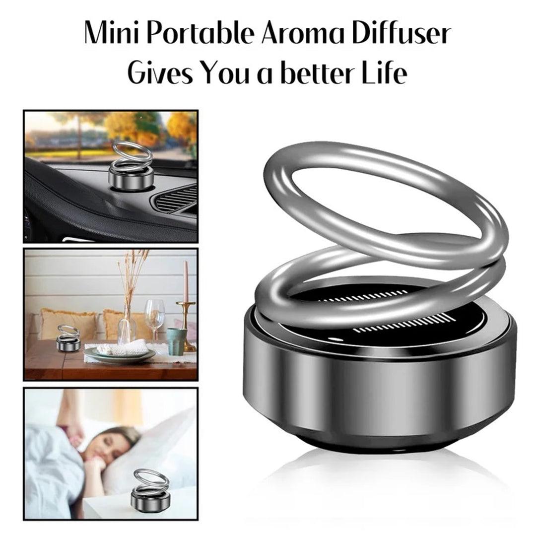 Portable Kinetic Heater - Mini Car Air Fresheners Auto Rotating Double Ring Solar Aromatherapy Perfume Diffuser Car Accessories - Tophatter Daily Deals