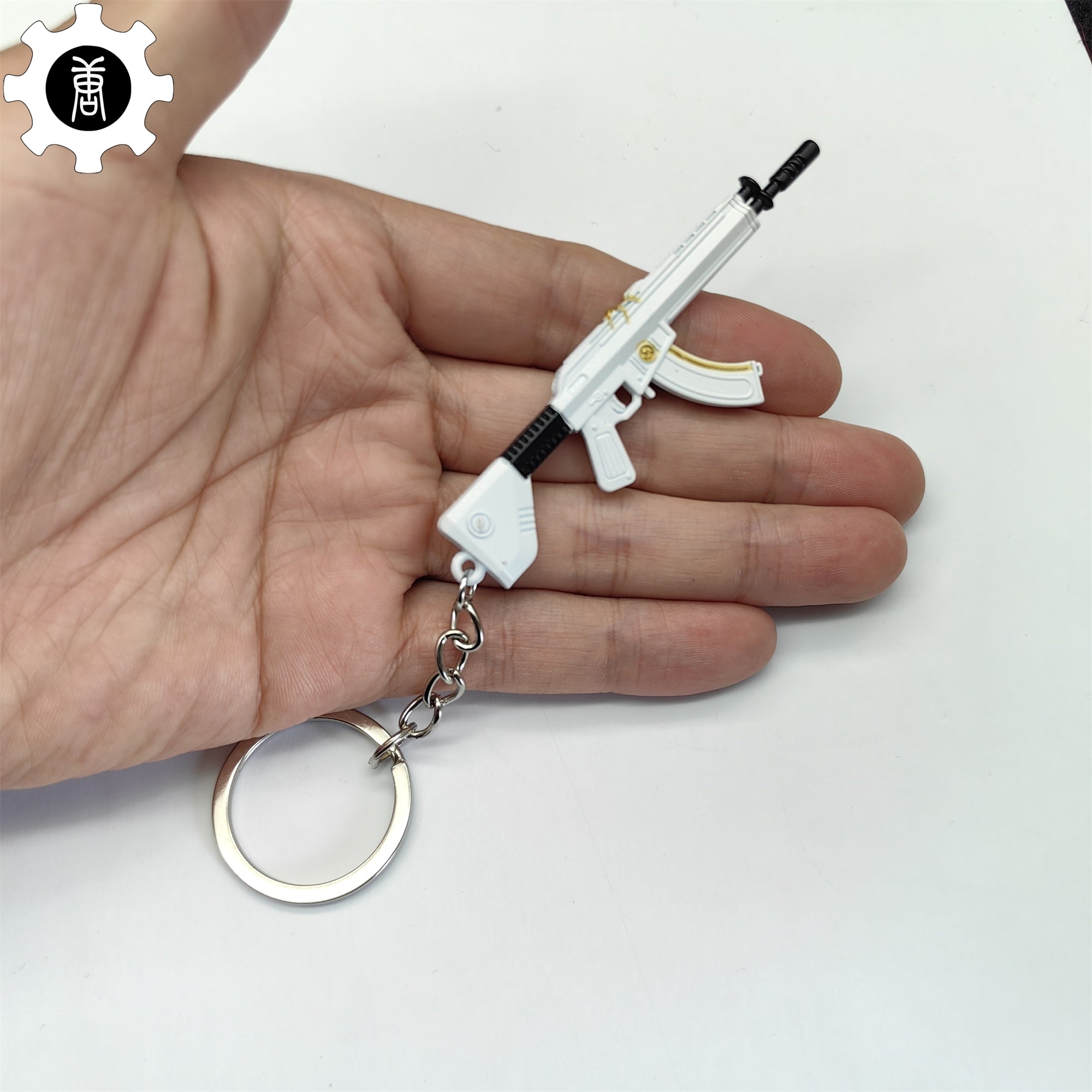 Tiny Neptune Vandal Gun Metal Keychain - Tophatter Daily Deals