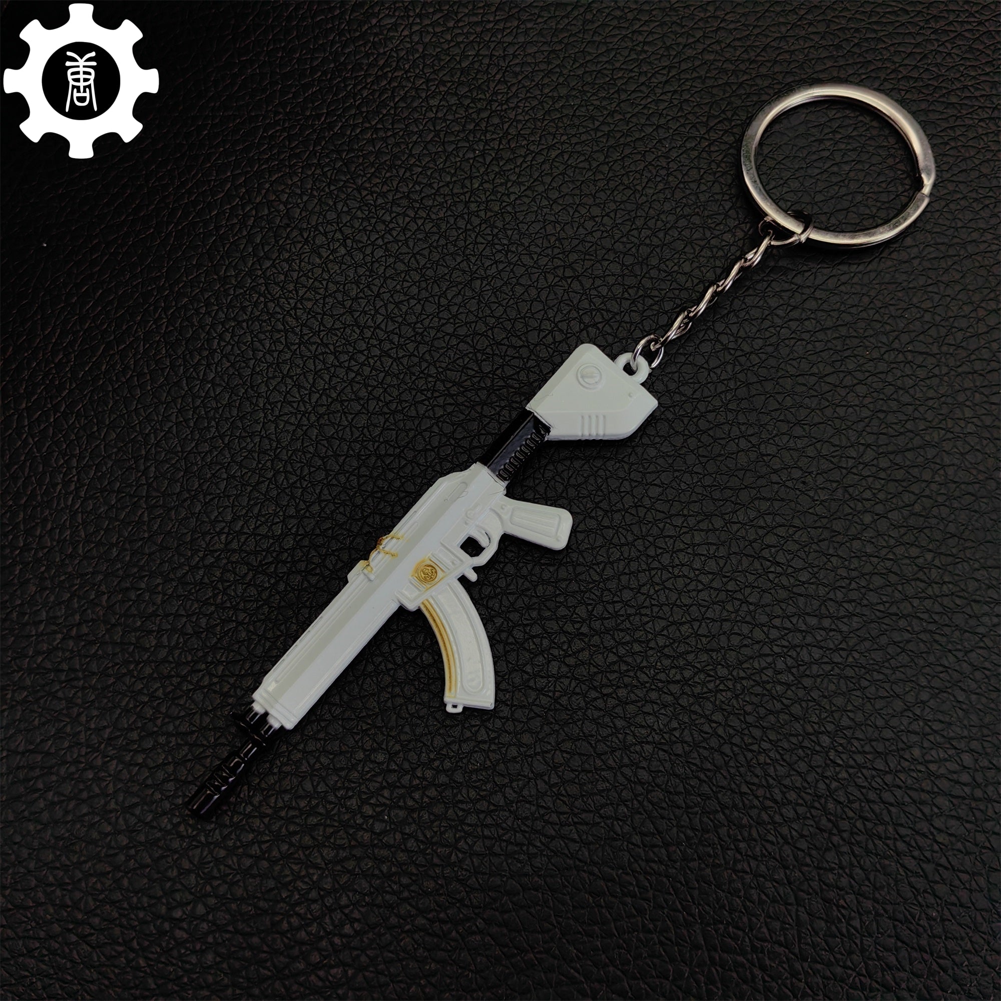 Tiny Neptune Vandal Gun Metal Keychain - Tophatter Daily Deals
