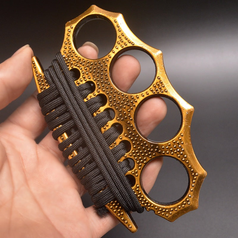 Outdoor self-defense metal brass knuckles duster four-finger hand buckle fitness training boxing finger buckle knuckle fist buckle defense broken window protective gear Gold - Tophatter Daily Deals
