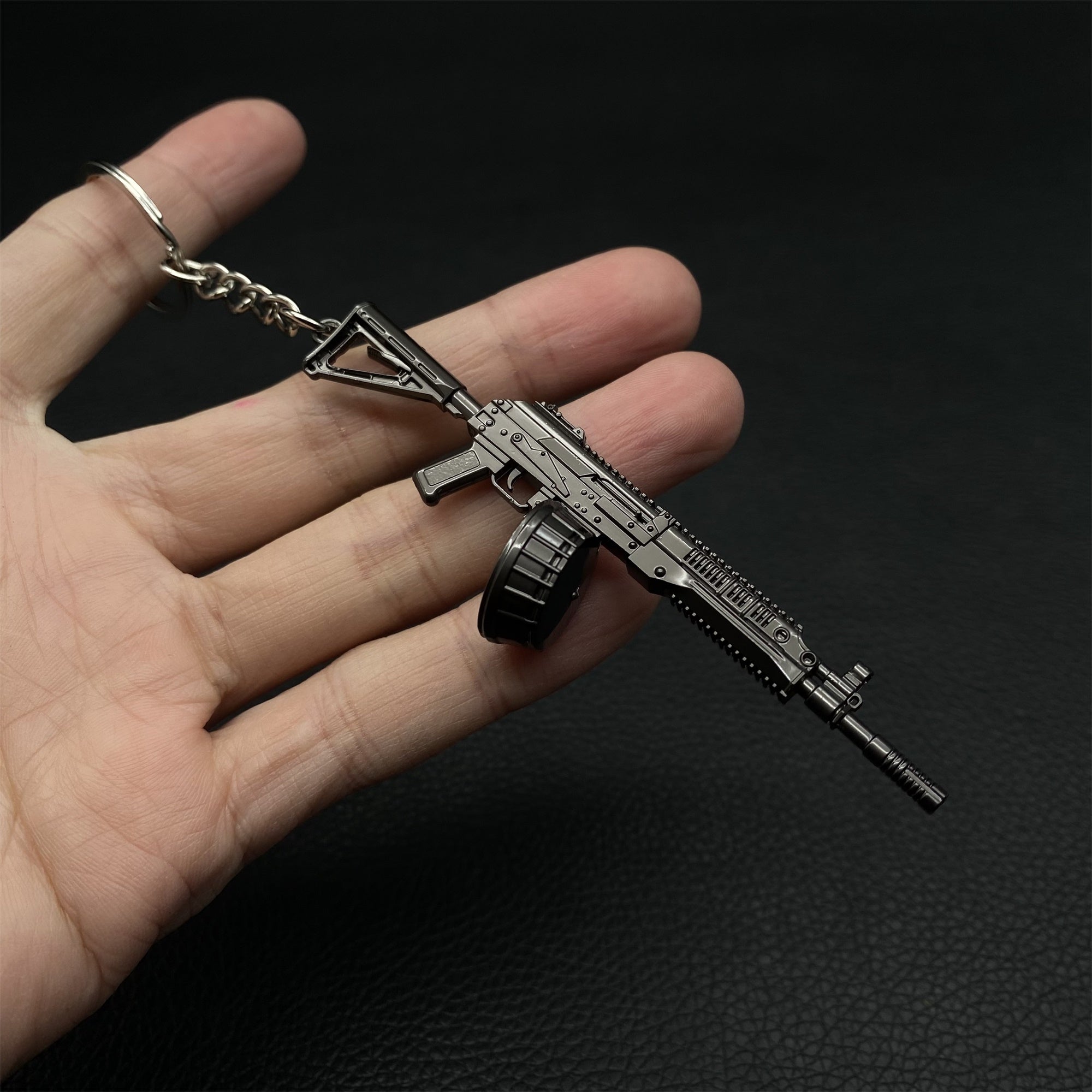 14 in 1 Keychain of Advanced Morden Gun With Accessories - Tophatter Daily Deals