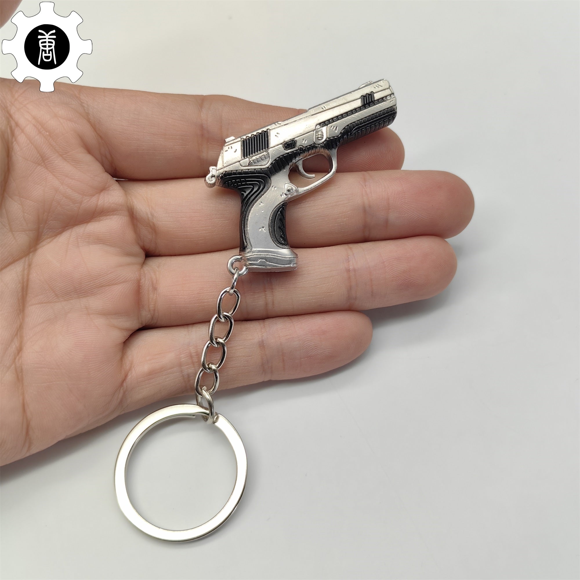 Val Radiant Crisis 001 Classic Gun Keychain Metal Backpack Pendant Keychain - Tophatter Daily Deals