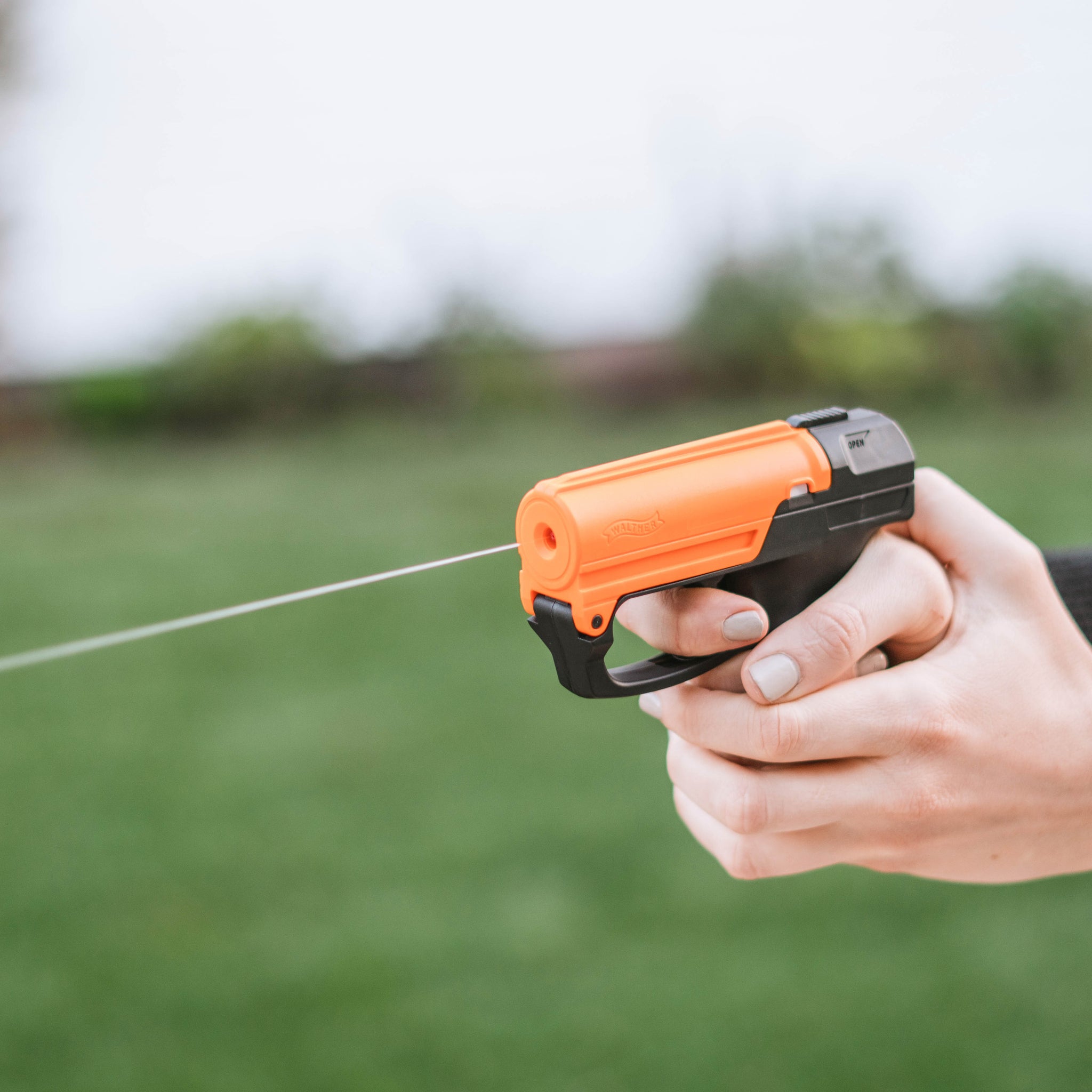 Aim and Fire Pepper Gel with Trigger and Grip Deployment Pepper Gun - Tophatter Daily Deals