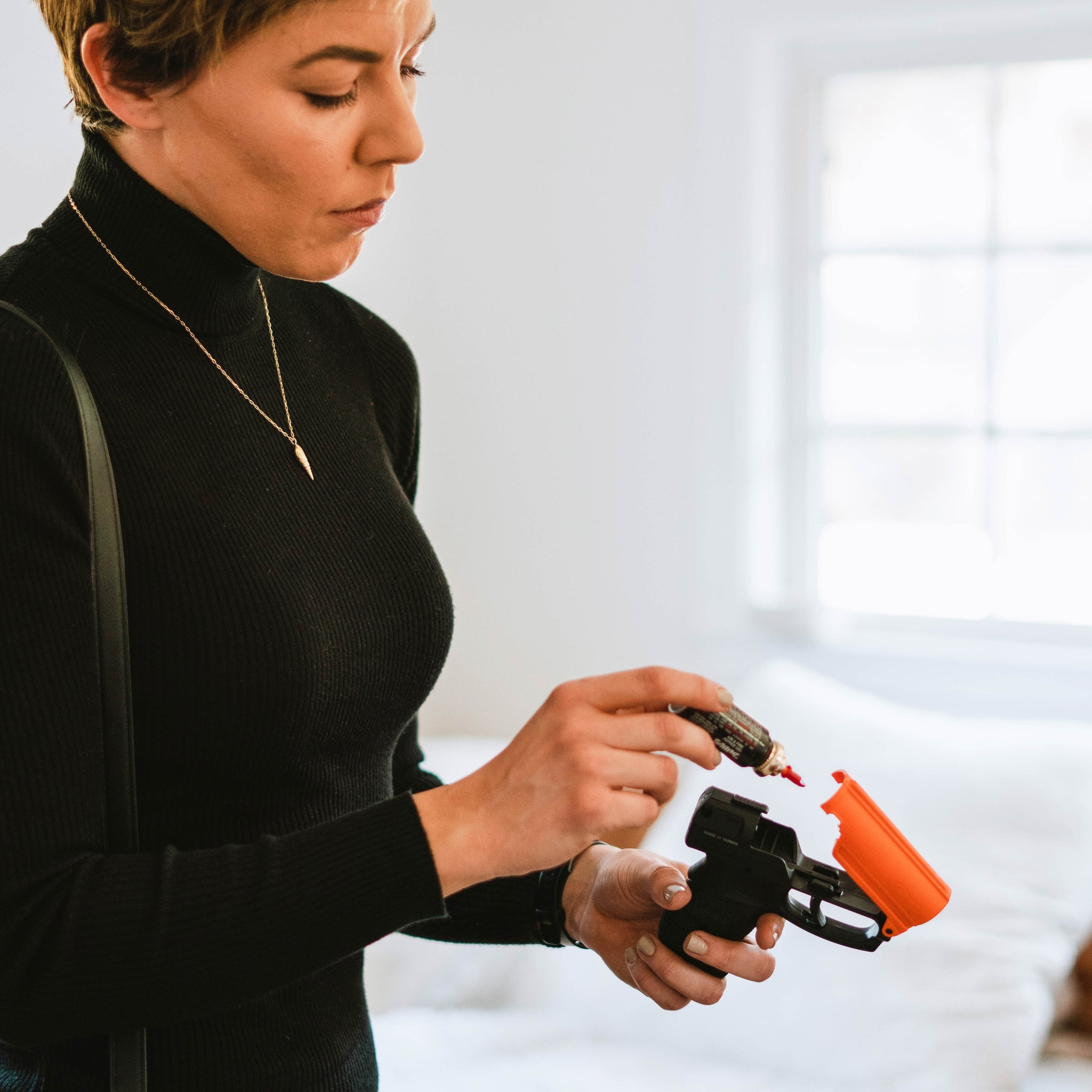 Aim and Fire Pepper Gel with Trigger and Grip Deployment Pepper Gun - Tophatter Daily Deals