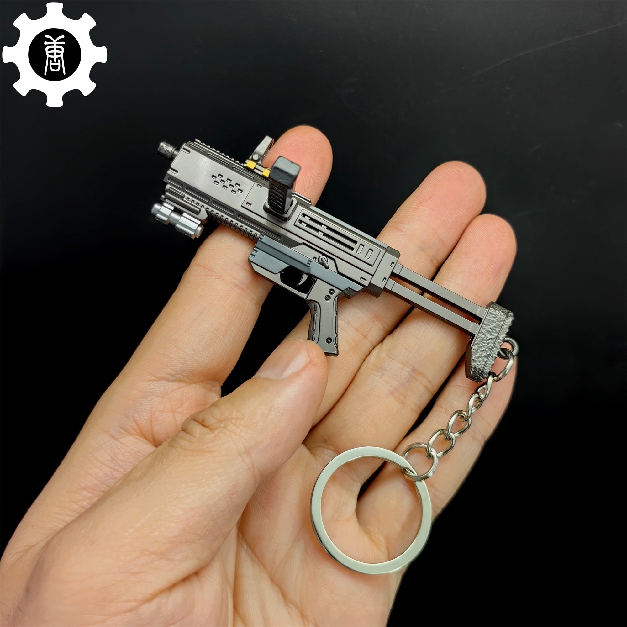 Tiny SMG-37 Defender Submachine Gun Model Metal Keychain - Tophatter Daily Deals