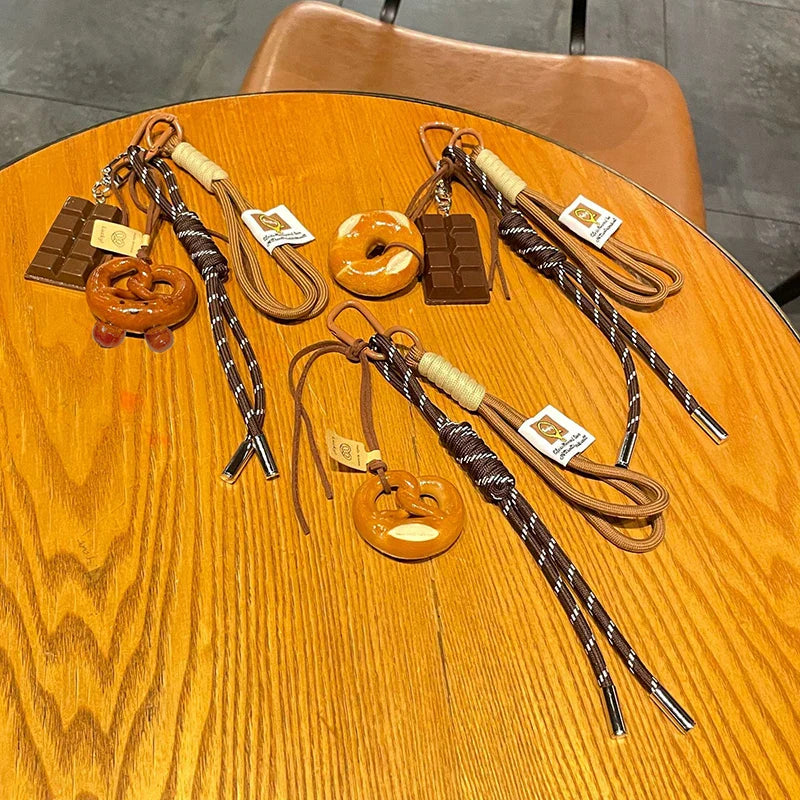 Woven Rope Bowknot Keychain With Cute Pastry Charms - Tophatter Daily Deals