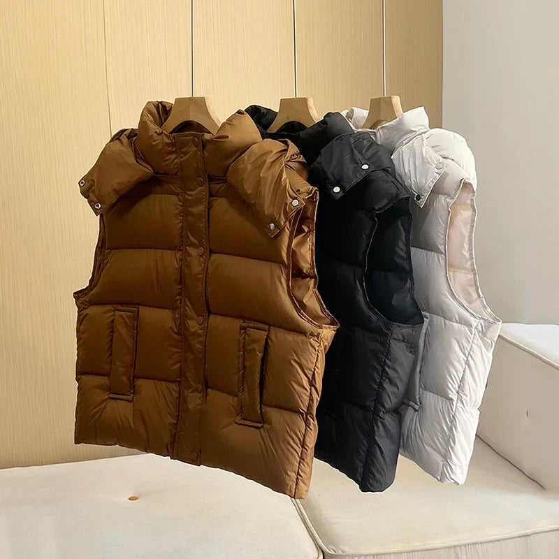 Insulating Women’s Hooded Puff Vest - Hip-Length, Down - Tophatter Daily Deals