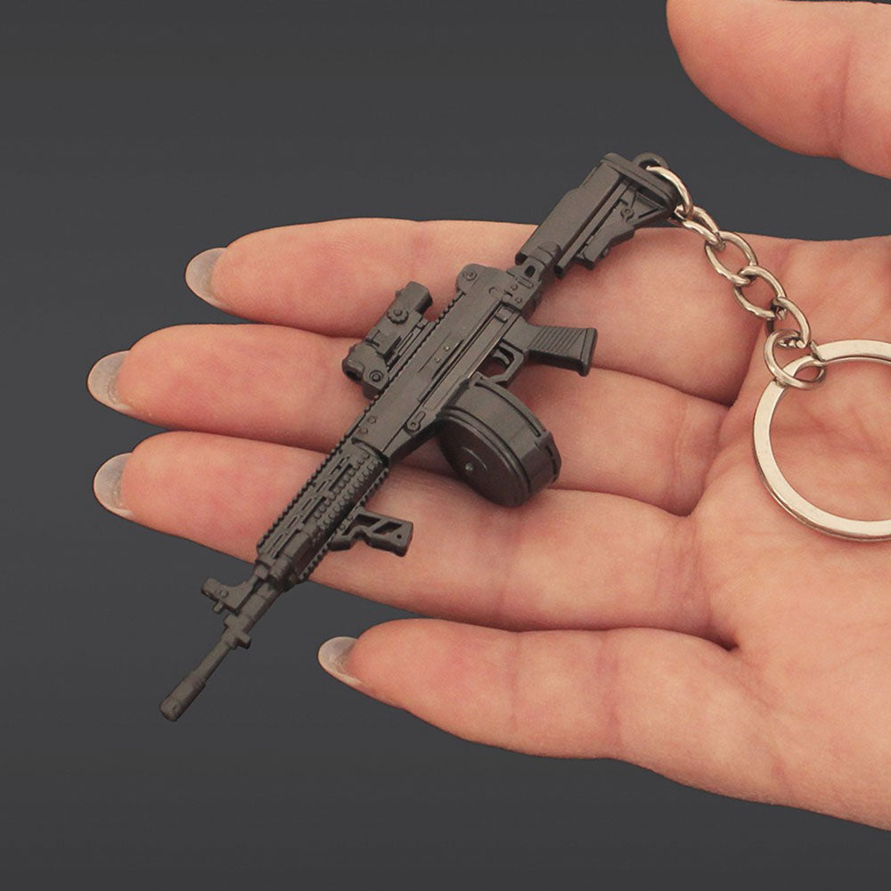 14 in 1 Keychain of Advanced Morden Gun With Accessories - Tophatter Daily Deals