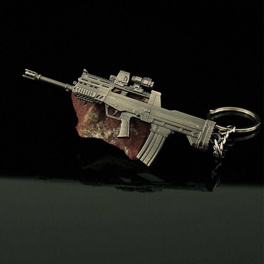 14 in 1 Keychain of Advanced Morden Gun With Accessories - Tophatter Daily Deals
