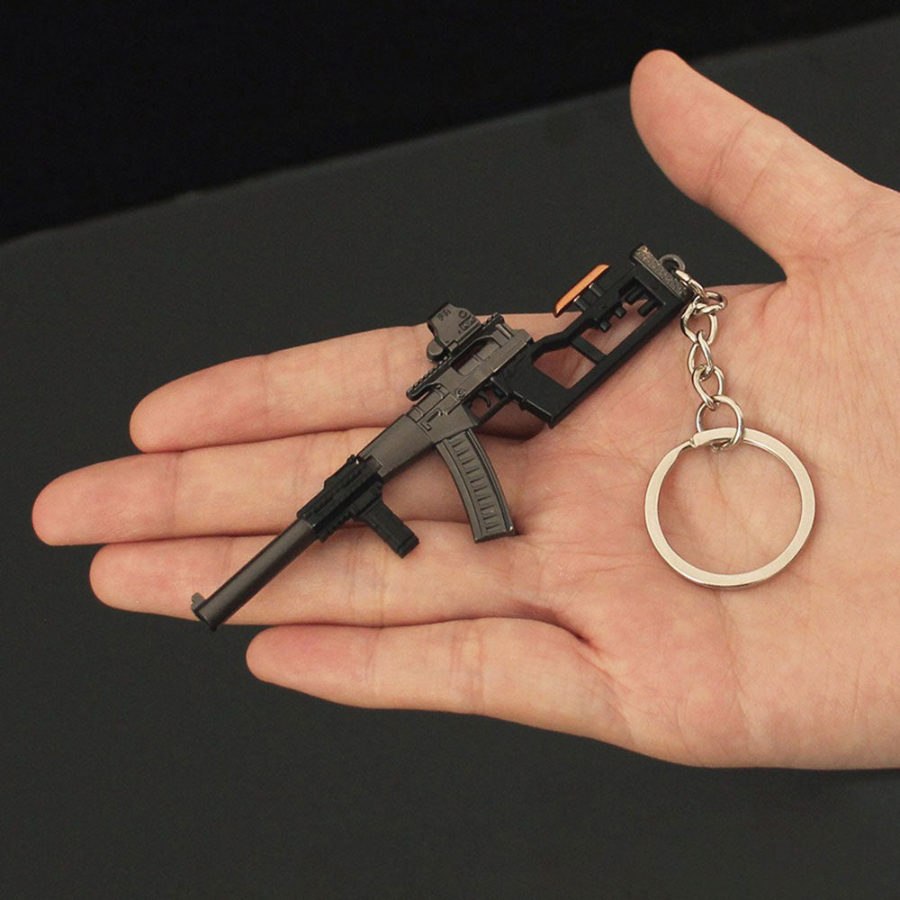 14 in 1 Keychain of Advanced Morden Gun With Accessories - Tophatter Daily Deals