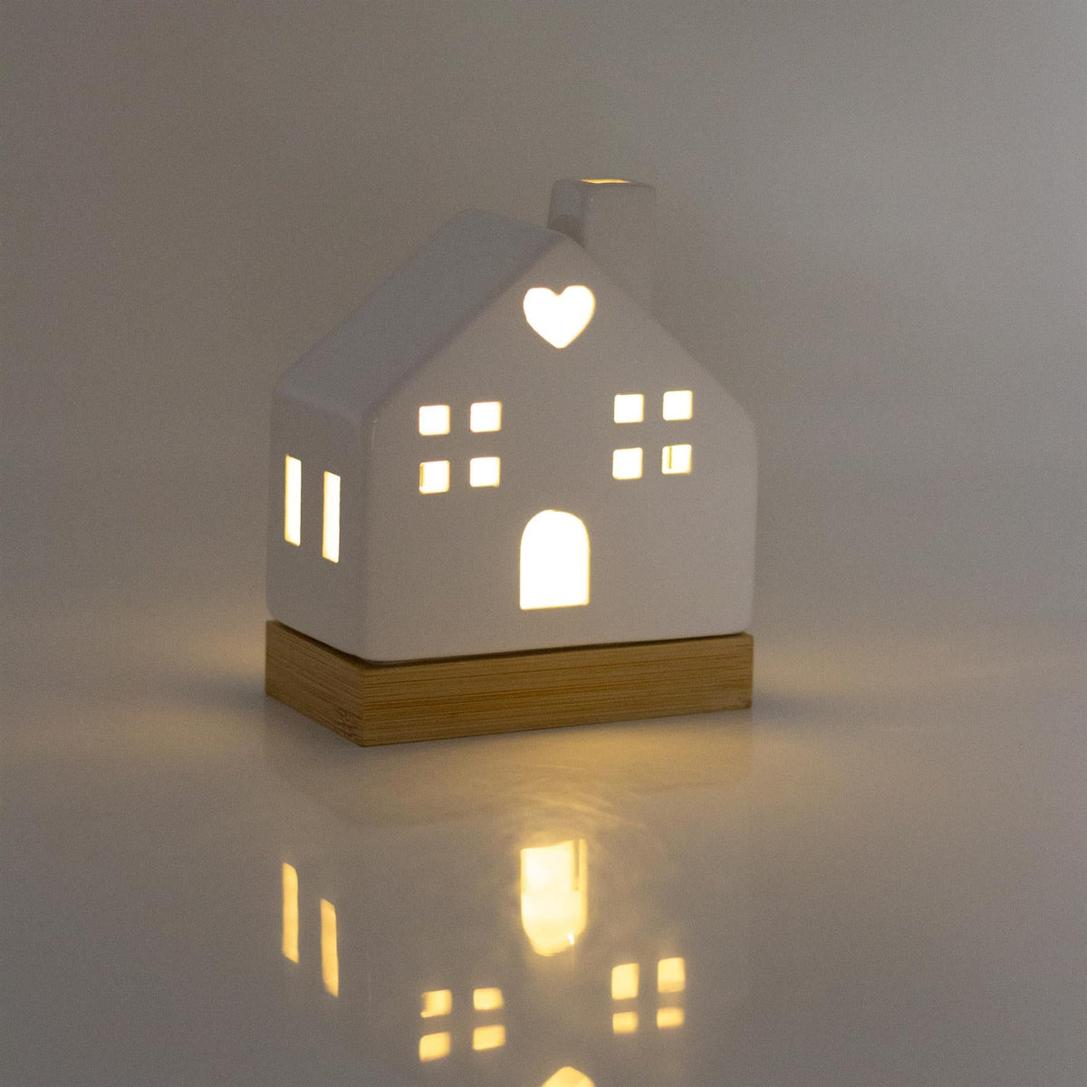 White Ceramic LED Christmas House Ornament On Bamboo Base | Light up Decoration Ornament - Tophatter Daily Deals