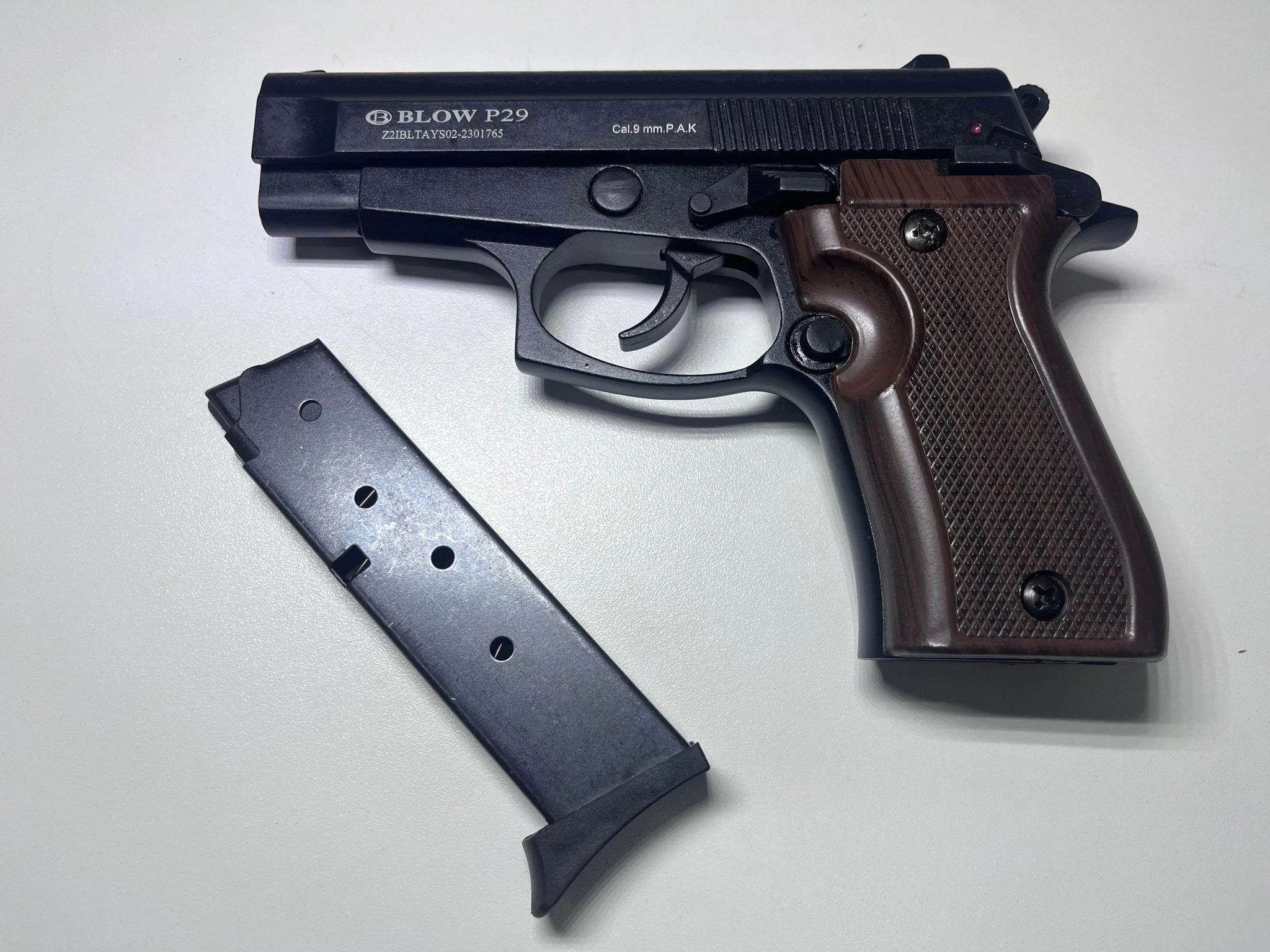 BLOW P29 BLACK W/BROWN GRIPS + 15 BLANKS + HOLSTER - Tophatter's Army Deals COMBOS - Tophatter Daily Deals