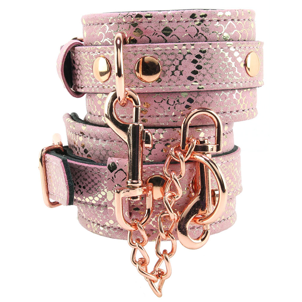 Locking Leather Wrist Restraint Cuffs in Pink Snake Print - Tophatter's Adult Products Bondage and Fetish > Wrist and Ankle Cuffs - Tophatter Daily Deals