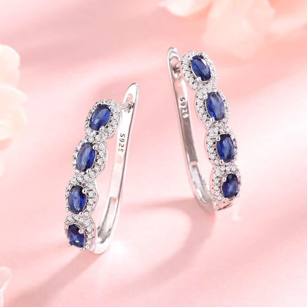 Sapphire Halo Simulated Huggie Earrings in Sterling Silver Earrings - Tophatter Daily Deals