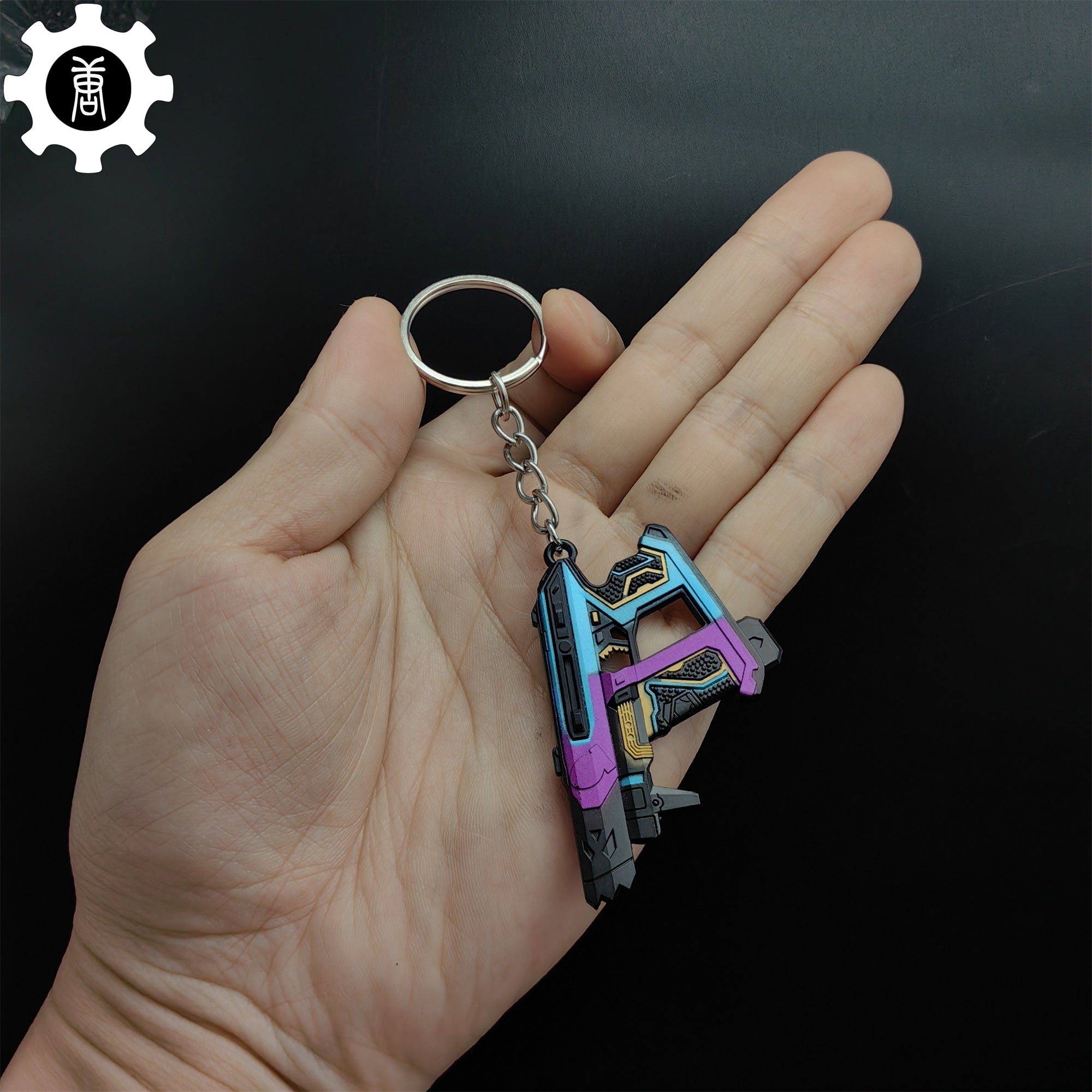 Small Glitchpop Frenzy Gun Metal Keychain - Tophatter Daily Deals