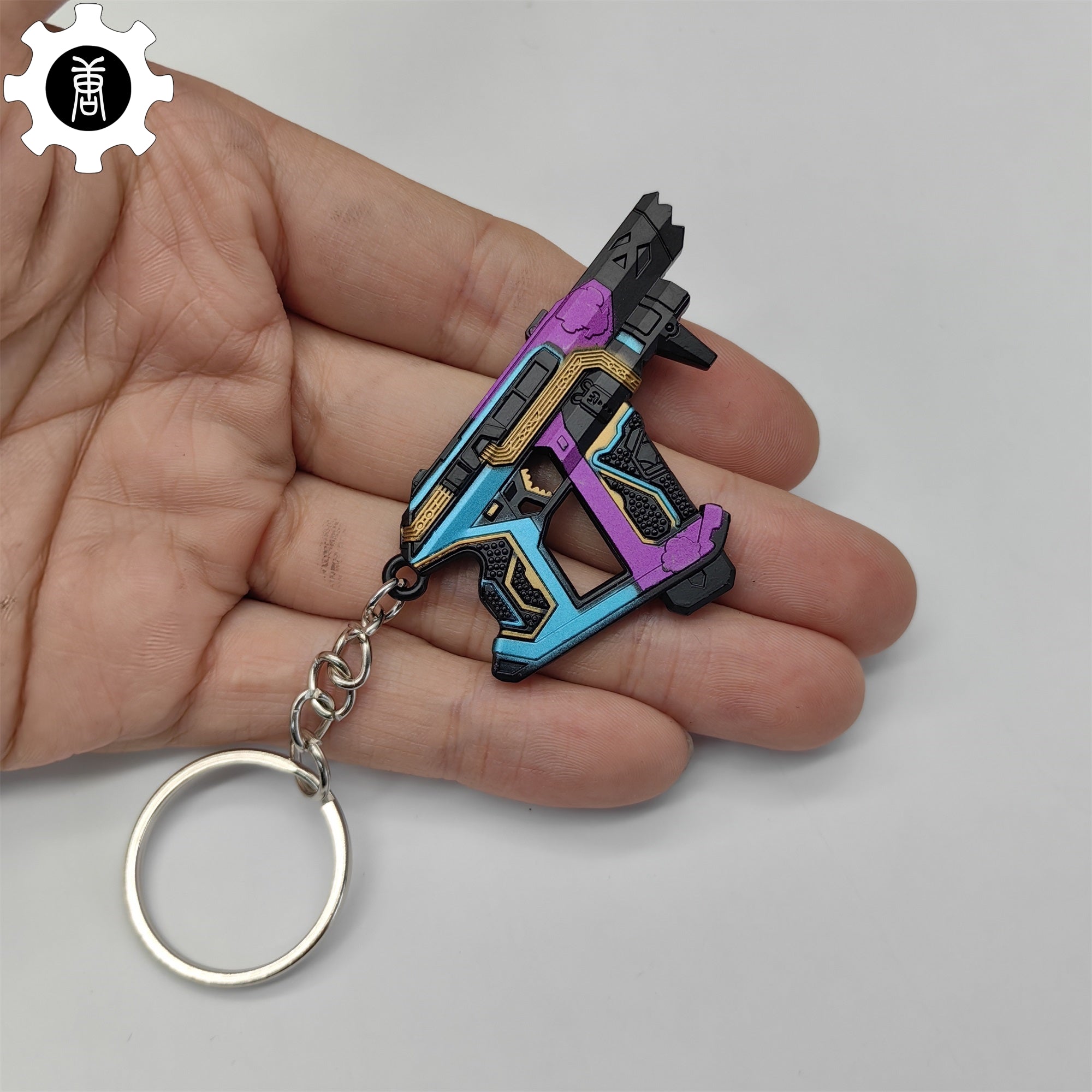 Small Glitchpop Frenzy Gun Metal Keychain - Tophatter Daily Deals