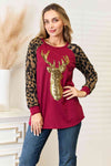 Heimish Full Size Animal Print Reindeer Top Wine Women's T-Shirts - Tophatter Daily Deals